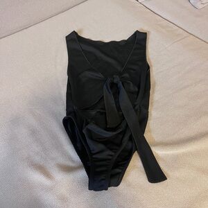 Black scallop-edged bodysuit from PrettyLittleThin